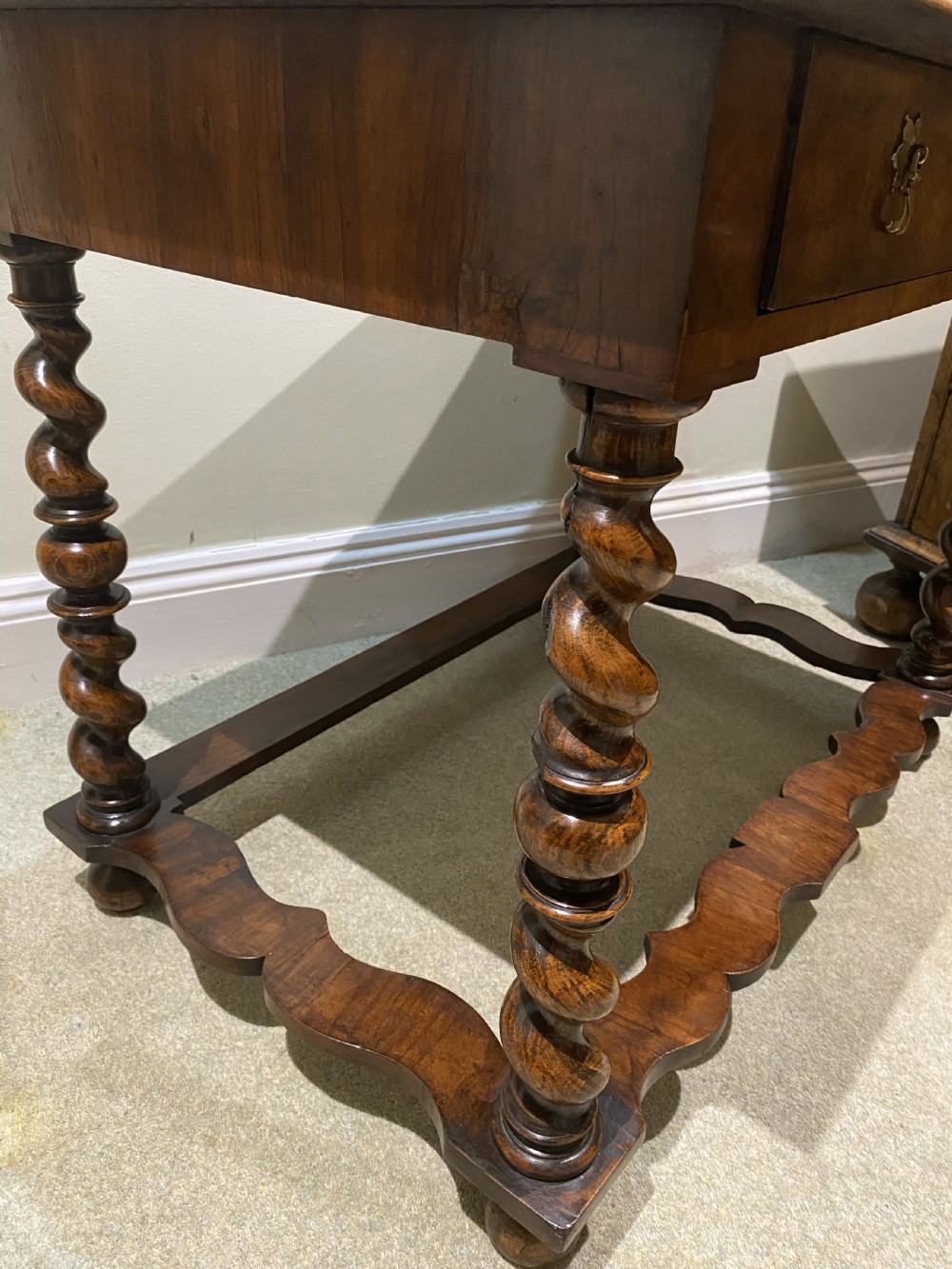 A William and Mary side table featuring an oyster olive veneer top with geometric holly inlays, spiral-turned legs, and shaped stretchers. View IV