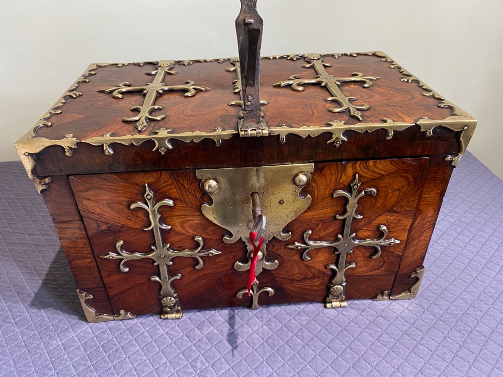 A rectangular late 17th-century William and Mary kingwood veneered coffre forte with pierced brass strapwork mounts and an accompanying brass key. View II