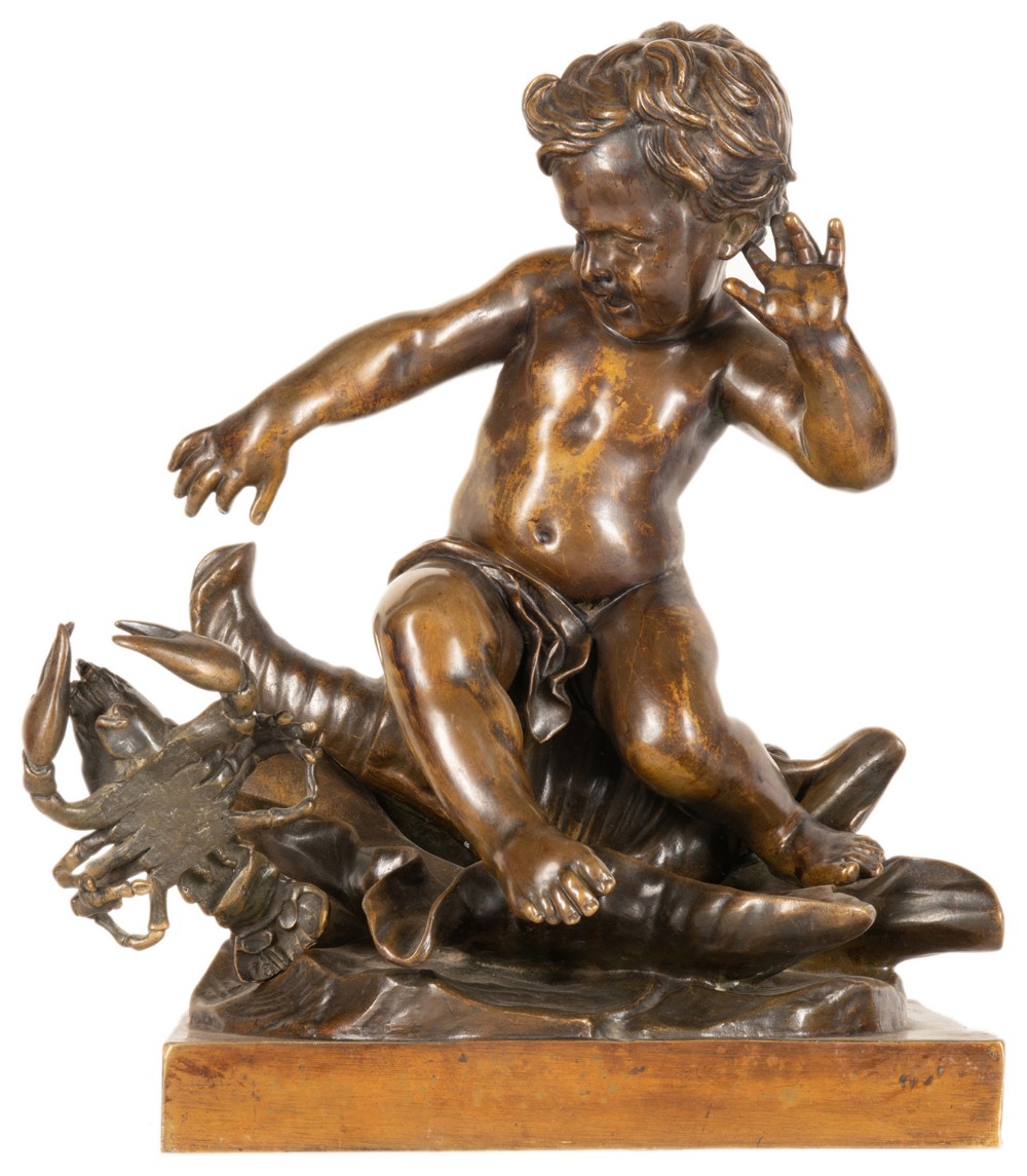 A 19th-century patinated bronze sculpture depicting a seated child reacting to a lobster on a shell, mounted on a square timber base.