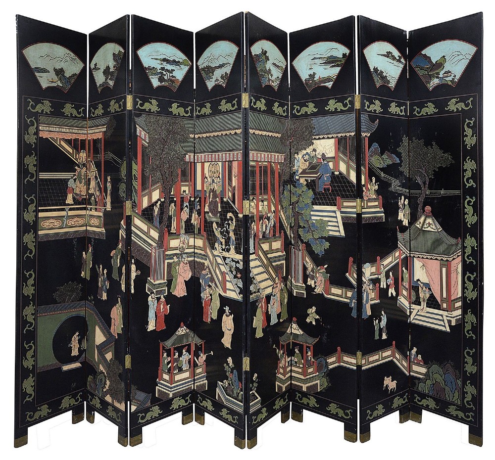 An eight-panel black Chinese Coromandel lacquer folding screen depicting narrative architectural scenes framed by dragon borders and fan-shaped landscapes.