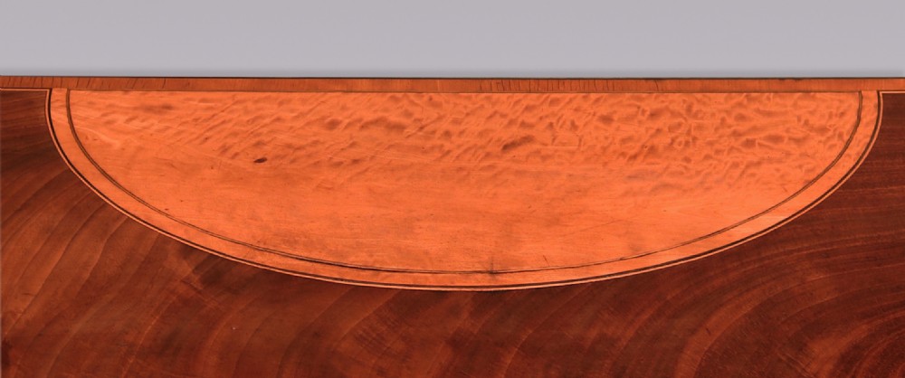 A demilune mahogany card table with satinwood crossbanding inlay and tapered square legs. View III