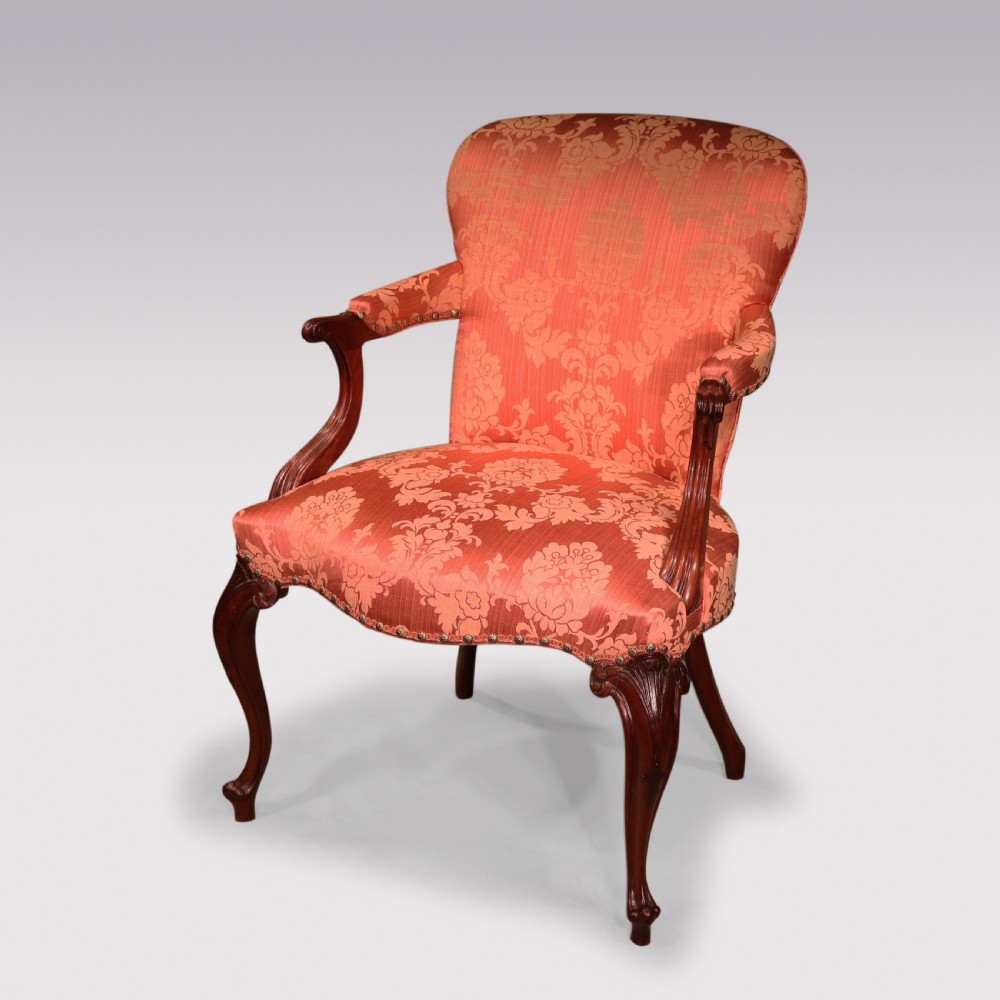 A set of four Hepplewhite period mahogany armchairs upholstered in coral red damask fabric with carved cabriole legs. View III