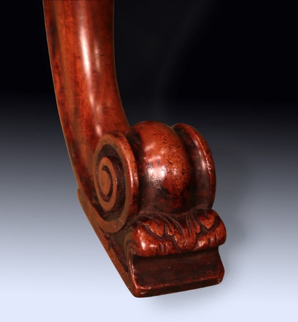 A dark mahogany tripod kettle stand featuring an octagonal tray top, fluted column stem, and carved acanthus leaf cabriole legs with scroll feet. View IV
