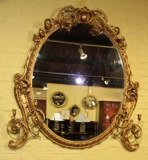 A Magnificent Oval Mirror with Foliate Decoration Circa 1850