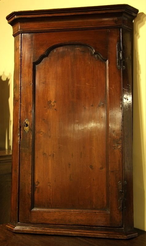 An Early 19th Century Pine Corner Cupboard