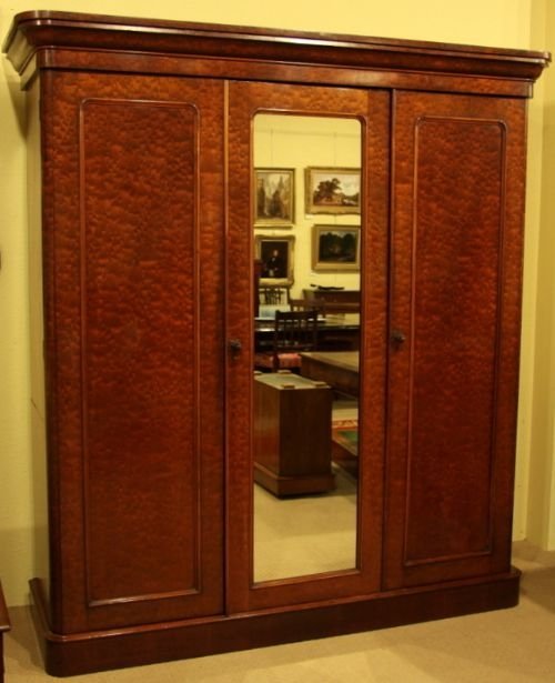 A Victorian Three Door Wardrobe in Plum Pudding Mahogany Circa 1860