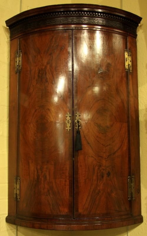 A Mid 18th Century Walnut Veneered Bow Corner Cabinet Circa 1755