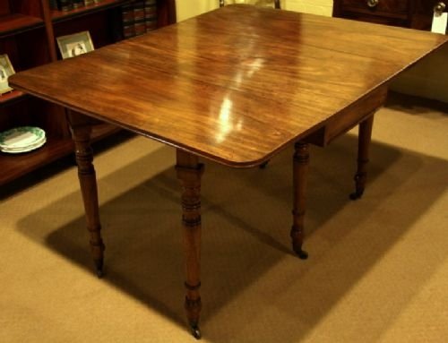 An Early 19th Century Mahogany Drop Flap Dining Table Circa 1820