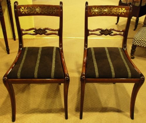An Exquisite Pair of Regency Mahogany Brass Inlaid Side Chairs