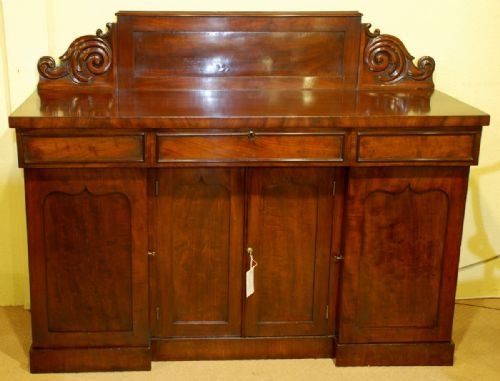 A Regency Mahogany Sideboard with Drawers and Cupboards
