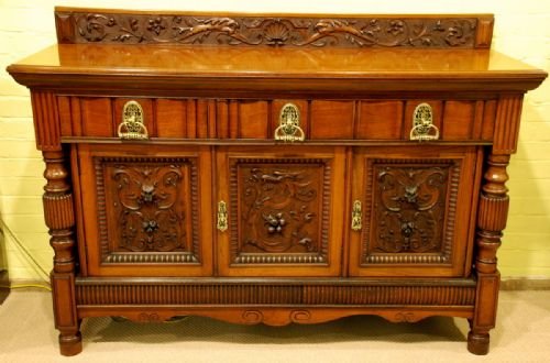 A Late Victorian Walnut Sideboard by Maple and Co Circa 1890