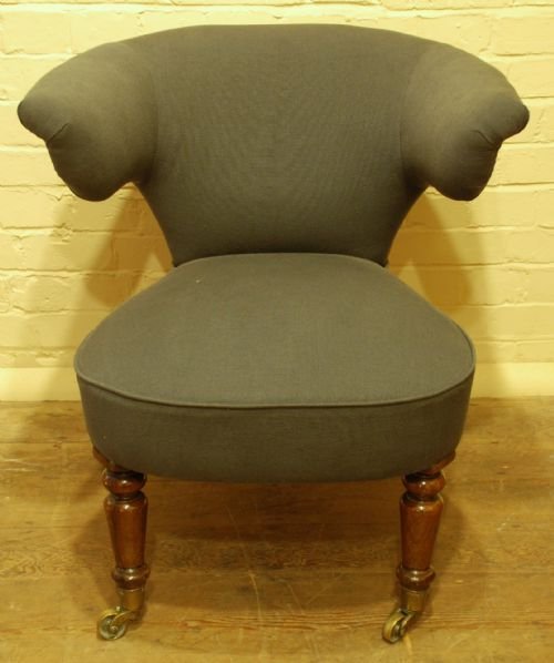 A Victorian Upholstered Rosewood Desk Chair.