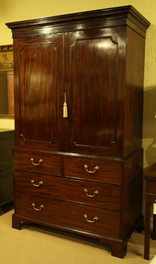 fig 1. A George III Mahogany Linen Press.