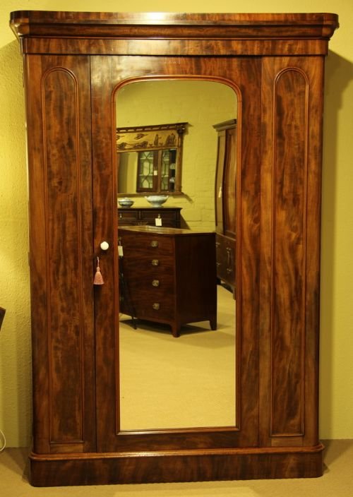 A Victorian Mahogany Wardrobe with Mirrored Doors.