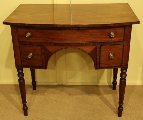 A Regency Mahogany Bow-front Dressing Table