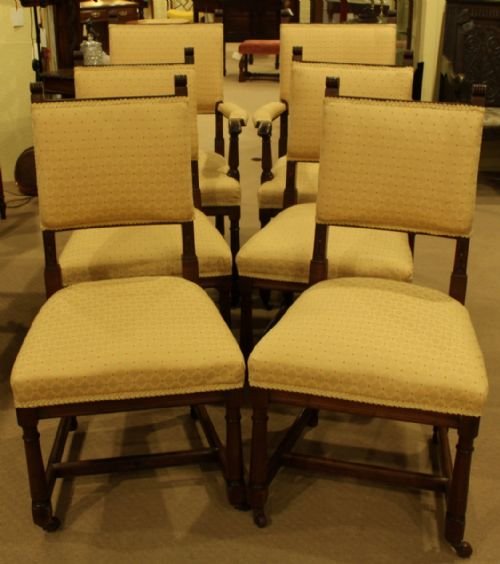 A Set of Six Henri II French Walnut Dining Chairs
