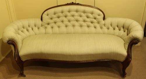 A Beautiful Serpentine Fronted Walnut Sofa