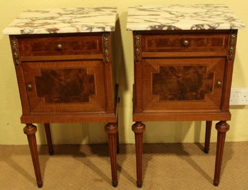 A Pair of Walnut Marble Topped Bedside Tables