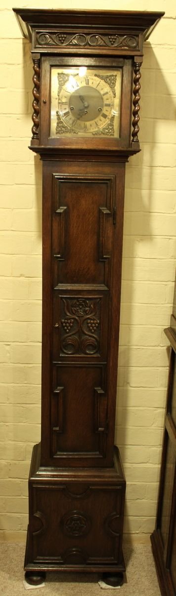 A Small Oak Jacobean Style Longcase Clock