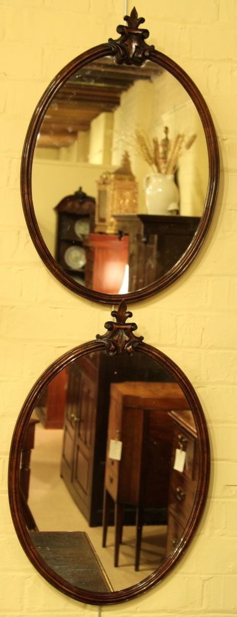 Pair of Mid 19th Century Oval Walnut Mirrors
