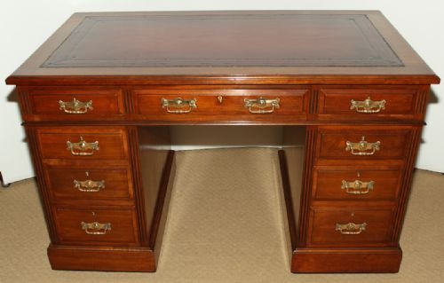 A Late 19th Century Walnut 3 Pedestal Desk