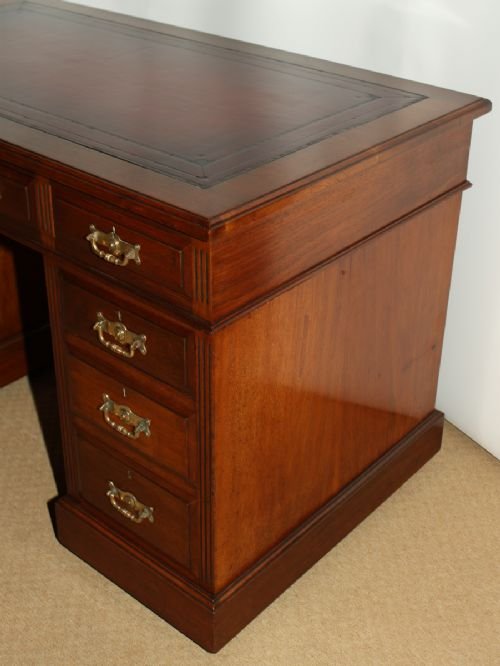 fig 1. A Late 19th century Walnut 3 Pedestal Desk