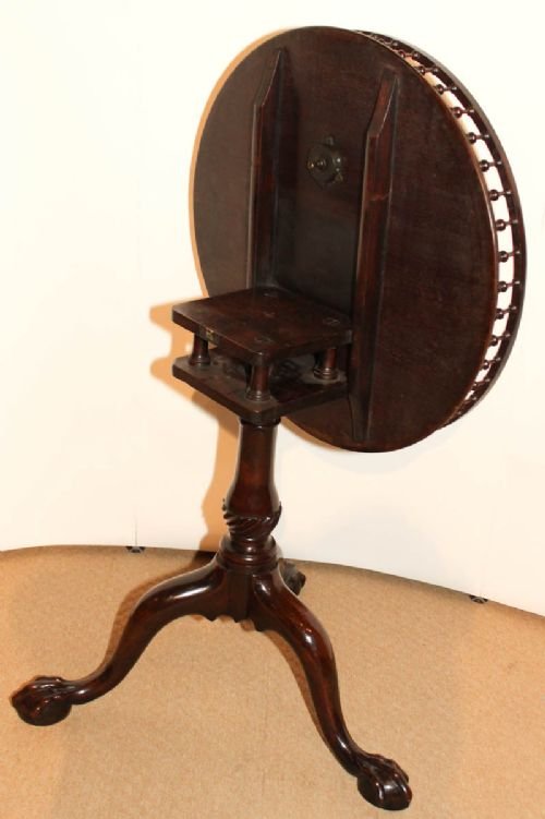 fig 1. Chippendale Cuban Mahogany Tea Table with brass inlay and galleried top with a birdcage