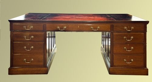 Late Edwardian Mahogany Nine Drawer Desk