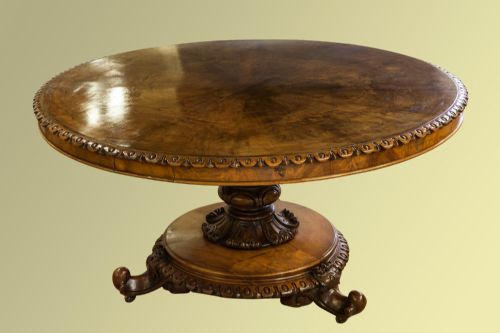 A Superb Quality Sunburst Walnut Table