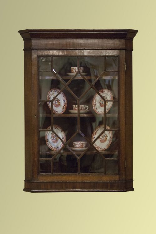 Early 19th Century Oak and Mahogany Glazed Corner Cupboard