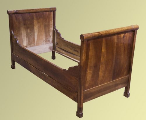 A French Cherrywood Child's Bed of Good Colour and Patination