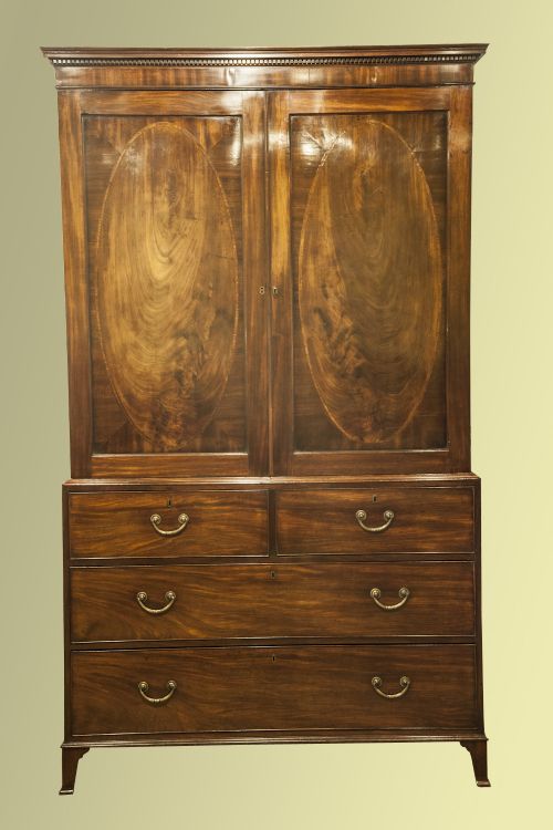 A Very Good Quality Mahogany Inlaid Linen-press with Oak Lined Drawers