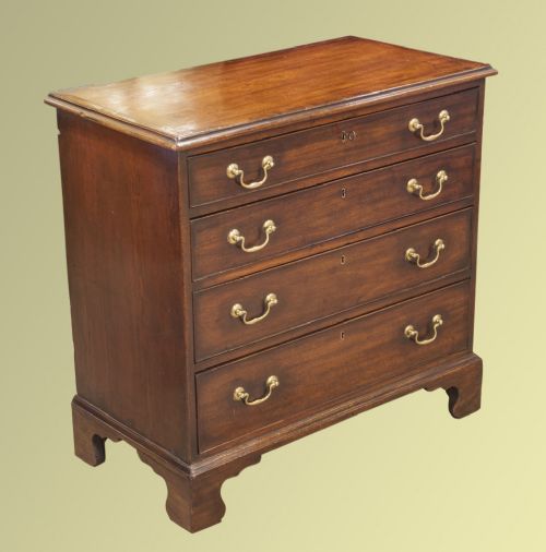 A George III Mahogany Chest of Drawers with Original Feet and Handles of Small Proportion