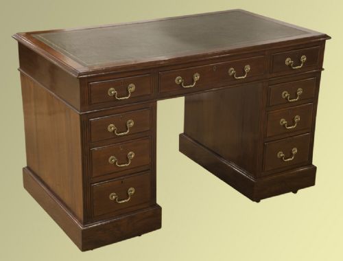 Edwardian Period Walnut Pedestal Desk with Green Leather Insert on a Plinth