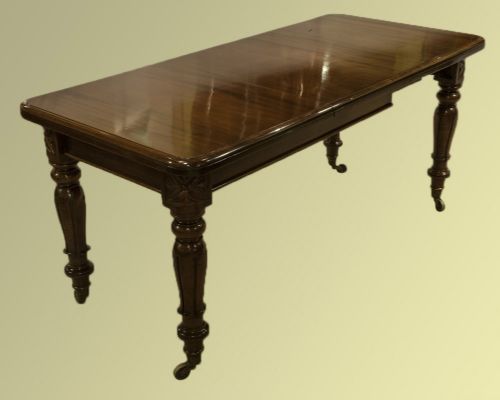 Single Leaf Mahogany Wind-out Dining Table on Tulip Legs and Brass Castors