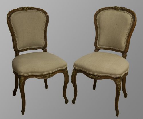 Pair of French 19th Century Walnut Chairs with Ormolu Mounts