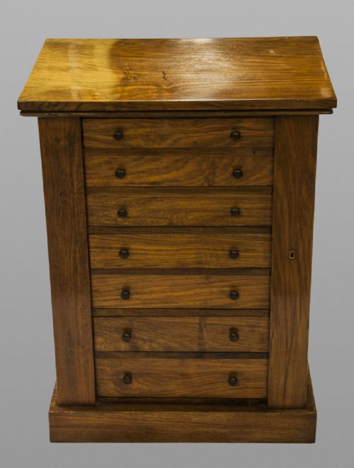 Small Seven Drawer Walnut Wellington Chest.