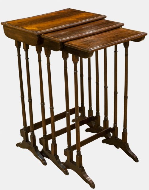 Nest of Three Rosewood Tables