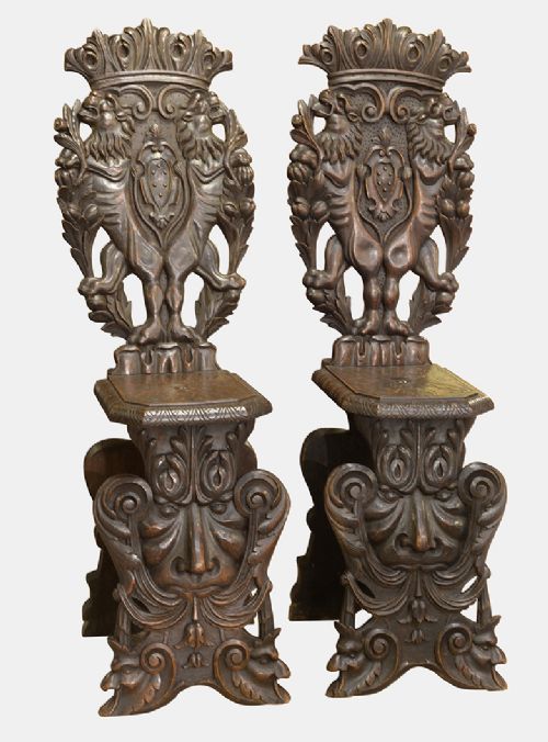 Pair of Continental Carved Oak Hall Chairs
