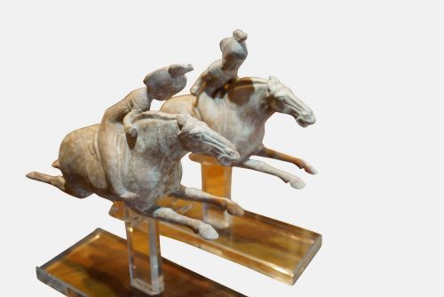 A Pair of Tang Dynasty Terracotta Leaping Horses