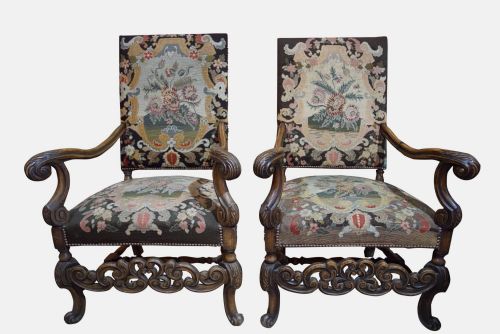 A Pair of French Walnut Arm Chairs
