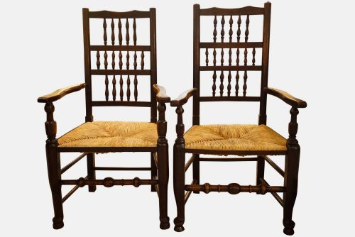A Pair of Beech & Elm Spindle Back Armchairs