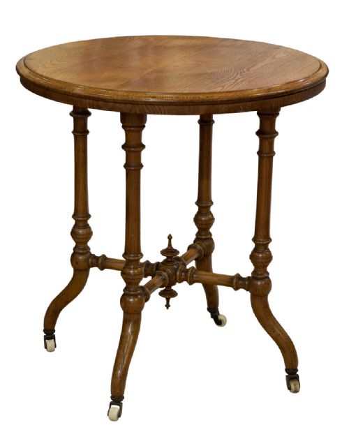 An Ashwood Arts and Crafts Low Coffee Table on Porcelain Castors