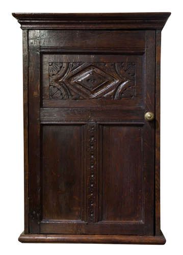 An Antique Carved and Panelled Shallow Hanging Cupboard