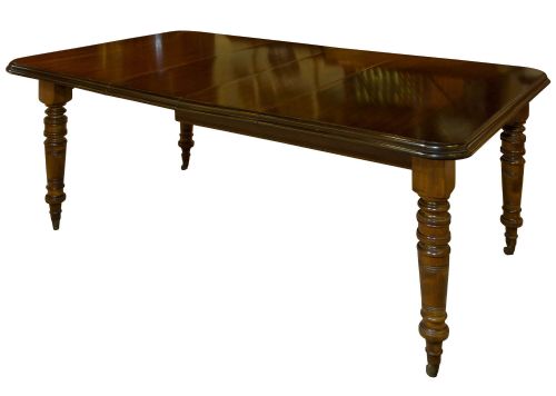 A Victorian Mahogany Two Leaf Extending Dining Table