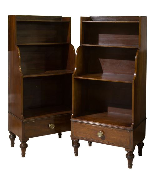 A Pair of Mahogany George III Style Waterfall Bookcases