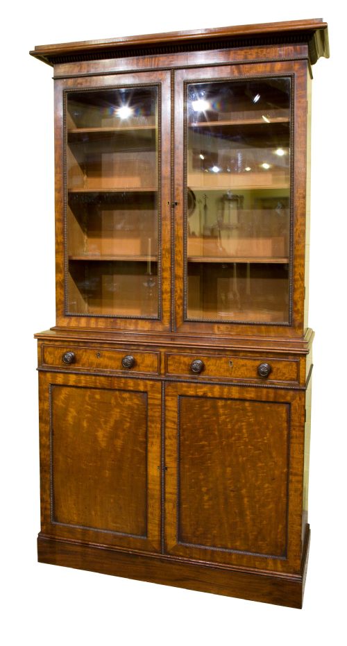 A Very Fine Regency Figured Mahogany 2 Part Bookcase