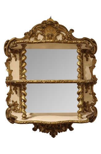 fig 1. A French Rococo Revival painted and gilt wall etagere featuring three shelves, carved scrollwork, spiral columns, and a mirrored back.