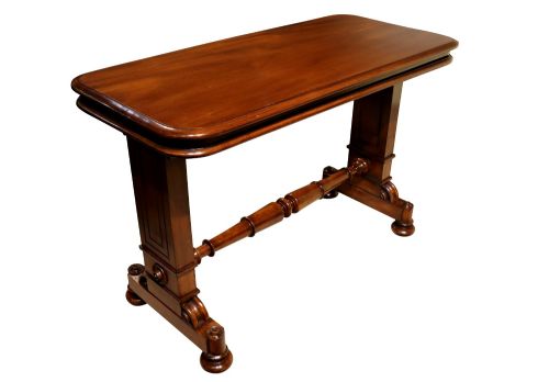 fig 1. A William IV polished mahogany three-tier buffet table featuring a mechanical rise and fall shelf structure supported by double upright columns and a carved trestle base.