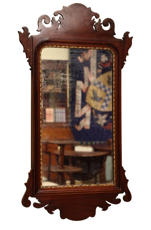 fig 1. A Victorian Chippendale style mahogany wall mirror featuring decorative fretwork scroll cresting and a gilded inner slip border.